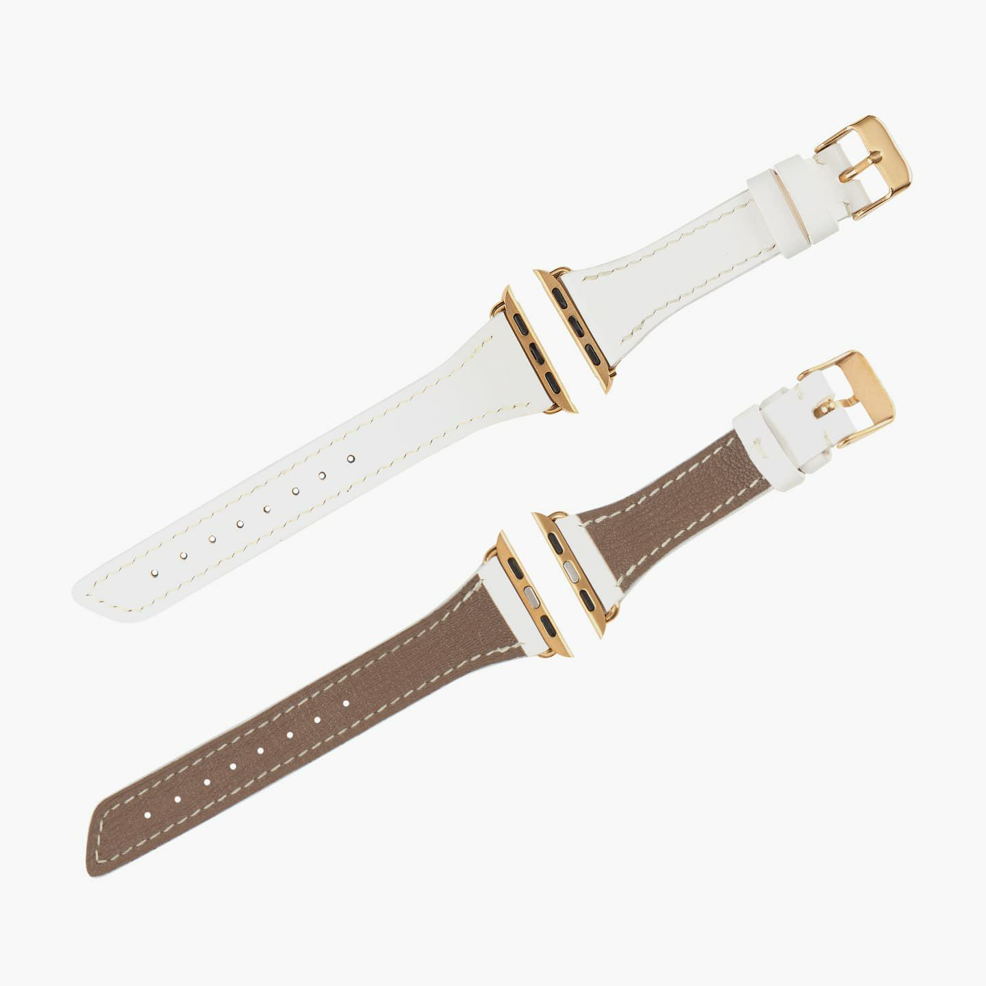 Apple Watch ケースサイズ：38 - 41 mm、表面（ブッテーロ）：White、裏面（シェーブル）：Etoupe、アダプター & 尾錠：Gold